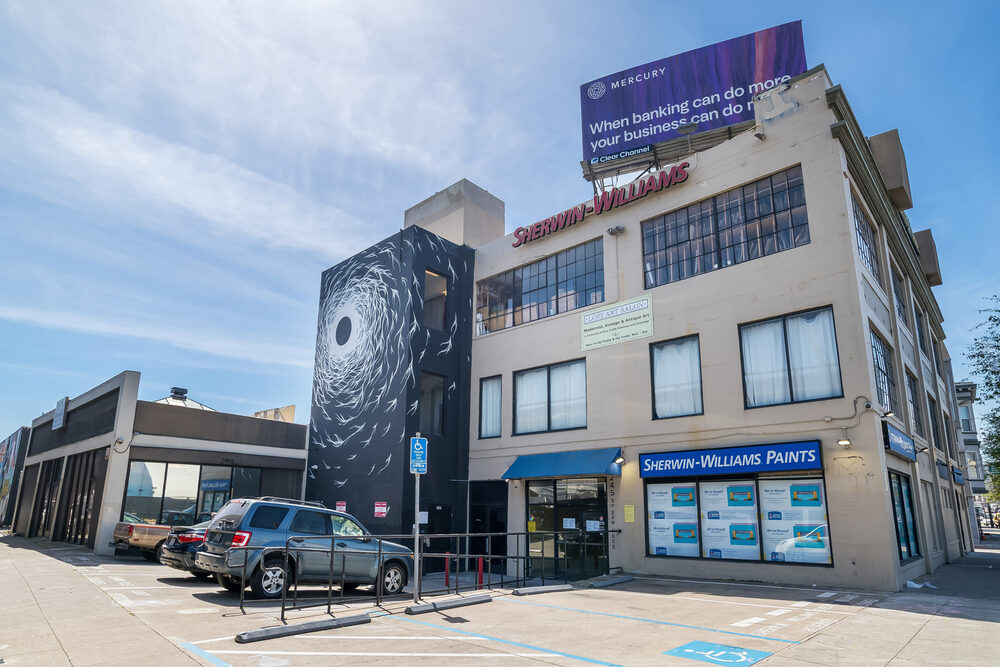 245 S Van Ness Avenue corner building with parking